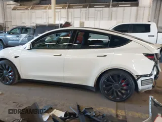 2021 Tesla Model Y Performance with VIN 5YJYGDEF4MF263473, listed as a IAAI auction lot 41851083 with 39,289 mi miles and . Bid and sale history available at DreamBid. Image 15.
