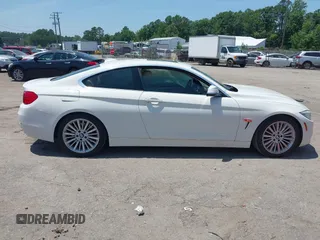 2014 BMW 4 Series 435i with VIN WBA3R1C52EF729201, listed as a IAAI auction lot 42579604 with 145,277 mi miles and . Bid and sale history available at DreamBid. Image 13.