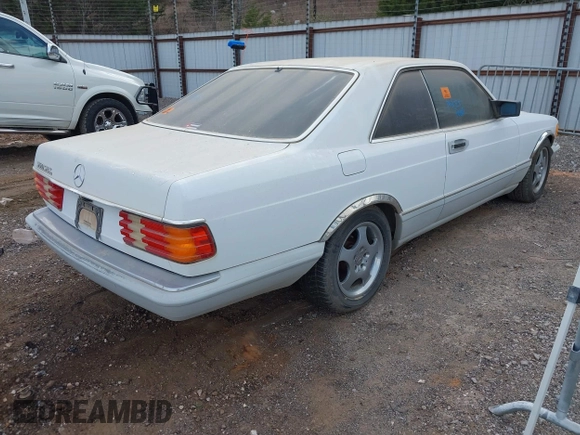 1990 Mercedes-Benz 560 with VIN WDBCA45E9LA549067, listed as a IAAI auction lot 41849642 with 124,516 mi miles and . Bid and sale history available at DreamBid. Image 4.