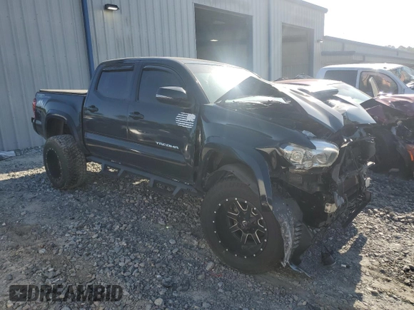 2018 Toyota Tacoma SR5 with VIN 3TMAZ5CN9JM067483, listed as a Copart auction lot 51476655 with 119,209 mi miles and Salvage Title. Bid and sale history available at DreamBid. Image 4.