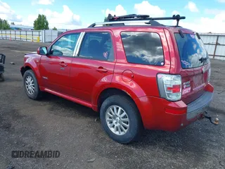 2008 Mercury Mariner Premier with VIN 4M2CU97178KJ00739, listed as a IAAI auction lot 42312408 with 167,591 mi miles and . Bid and sale history available at DreamBid. Image 3.