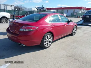 2009 Mazda 6 S Grand Touring with VIN 1YVHP82B495M13805, listed as a IAAI auction lot 41595504 with 156,432 mi miles and . Bid and sale history available at DreamBid. Image 4.