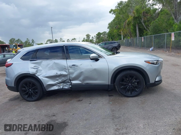2023 Mazda CX-9 Touring Plus with VIN JM3TCBAY7P0652913, listed as a IAAI auction lot 42186917 with 20,649 mi miles and . Bid and sale history available at DreamBid. Image 13.