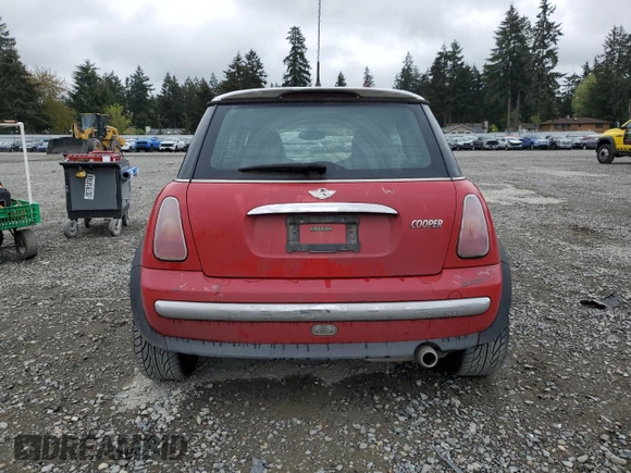 2004 MINI Hardtop with VIN WMWRC33464TJ54261, listed as a Copart auction lot 55150205 with 212,636 mi miles and Salvage Title. Bid and sale history available at DreamBid. Image 6.