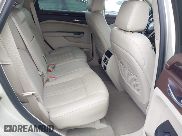 2014 Cadillac SRX Luxury Collection z VIN 3GYFNBE31ES628346, wystawiony jako IAAI lot #41709425 z przebiegiem 47 634 mil mil oraz . Historia ofert i sprzedaży dostępna na DreamBid. Obrazek 8.