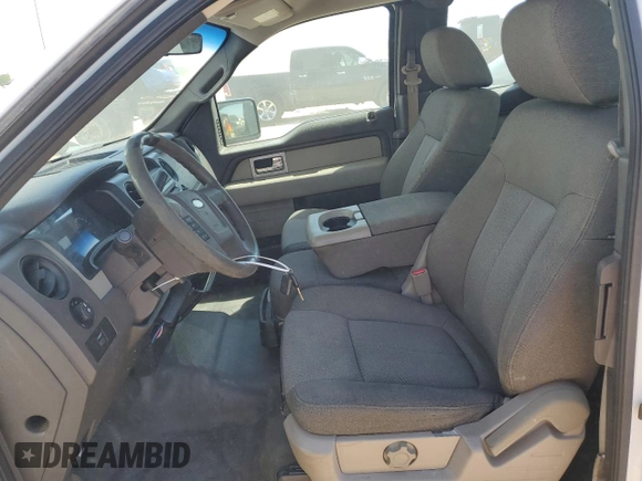 2009 Ford F-150 STX with VIN 1FTRX14809FA24799, listed as a Copart auction lot 51811255 with 123,501 mi miles and Clean title. Bid and sale history available at DreamBid. Image 7.
