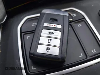 2022 Acura TLX w/A-Spec Package z VIN 19UUB5F53NA002629, wystawiony jako IAAI lot #41836622 z przebiegiem 51 815 mil mil oraz . Historia ofert i sprzedaży dostępna na DreamBid. Obrazek 11.