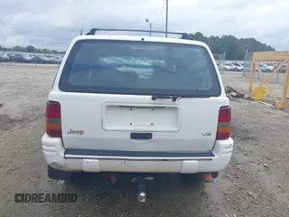 1996 Jeep Grand Cherokee Limited z VIN 1J4GZ78YXTC191527, wystawiony jako IAAI lot #42352616 z przebiegiem 325 927 mil mil oraz . Historia ofert i sprzedaży dostępna na DreamBid. Obrazek 17.