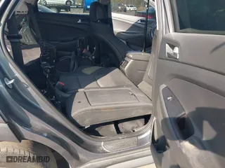 2017 Hyundai Tucson Value with VIN KM8J33A24HU281183, listed as a IAAI auction lot 41563886 with 71,110 mi miles. Bid and sale history available at carsss.com. Image 8.