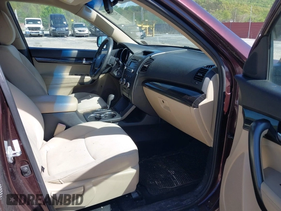 2012 Kia Sorento LX with VIN 5XYKTCA64CG279195, listed as a IAAI auction lot 42144679 with 116,690 mi miles. Bid and sale history available at carsss.com. Image 5.