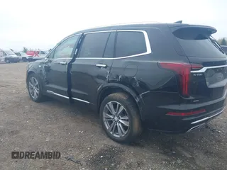 2025 Cadillac XT6 AWD Premium Luxury z VIN 1GYKPDRS3SZ106449, wystawiony jako IAAI lot #41994374 z przebiegiem 3 675 mil mil oraz . Historia ofert i sprzedaży dostępna na DreamBid. Obrazek 3.