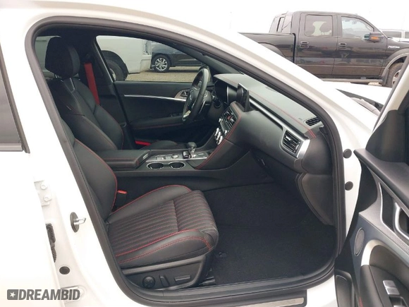 2023 Genesis G70 2.0T with VIN KMTG34TA1PU130245, listed as a IAAI auction lot 41198085 with 21,483 mi miles. Bid and sale history available at carsss.com. Image 5.
