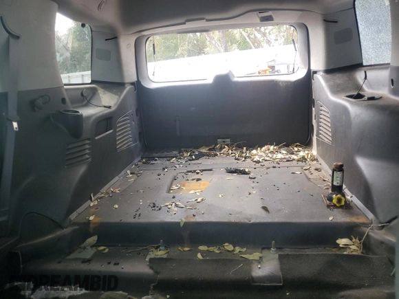 2015 Chevrolet Tahoe z VIN 1GNSK3EC3FR305401, wystawiony jako Copart lot #80819994 z przebiegiem Nie podano mil oraz Szkoda całkowita • Salvage title. Historia ofert i sprzedaży dostępna na DreamBid. Obrazek 10.