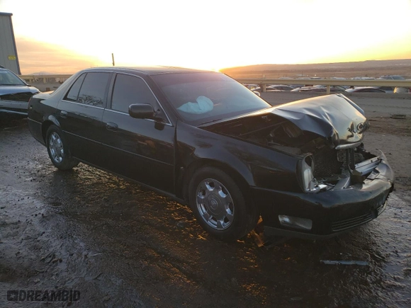 2005 Cadillac DeVille with VIN 1G6KD54Y45U165109, listed as a Copart auction lot 84695674 with 92,569 mi miles and Salvage Title. Bid and sale history available at carsss.com. Image 4.