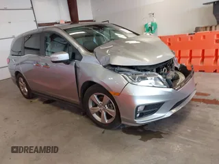 2019 Honda Odyssey EX-L z VIN 5FNRL6H78KB036400, wystawiony jako IAAI lot #42324335 z przebiegiem 66 080 mil mil oraz . Historia ofert i sprzedaży dostępna na DreamBid. Obrazek 1.