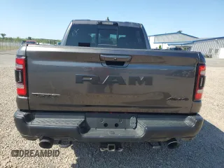 2021 Ram 1500 z VIN NCS107300, wystawiony jako Copart lot #66329055 z przebiegiem 25 123 mil mil oraz Szkoda całkowita • Salvage title. Historia ofert i sprzedaży dostępna na DreamBid. Obrazek 6.