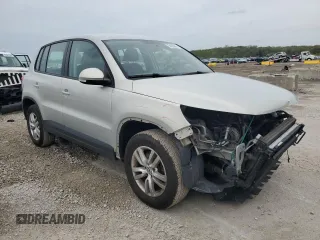 2014 Volkswagen Tiguan S z VIN WVGBV3AX8EW594957, wystawiony jako Copart lot #54565655 z przebiegiem 81 569 mil mil oraz Szkoda całkowita • Salvage title. Historia ofert i sprzedaży dostępna na DreamBid. Obrazek 4.