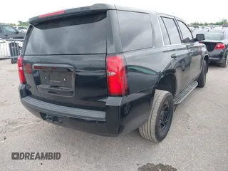 2018 Chevrolet Tahoe Commercial z VIN 1GNLCDEC6JR204921, wystawiony jako IAAI lot #42039630 z przebiegiem 96 008 mil mil oraz . Historia ofert i sprzedaży dostępna na DreamBid. Obrazek 4.