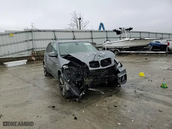 2012 BMW X5 M with VIN 5YMGY0C54CLK27815, listed as a Copart auction lot 83010304 with 0 mi miles and Salvage Title. Bid and sale history available at carsss.com. Image 11.