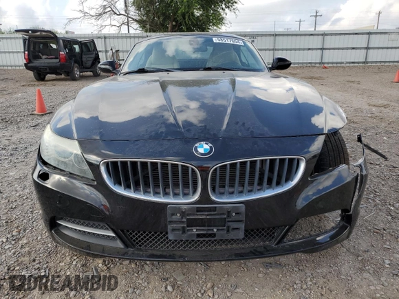 2011 BMW Z4 sDrive30i with VIN WBALM5C54BE378752, listed as a Copart auction lot 58517654 with 86,596 mi miles and Clean Title. Bid and sale history available at carsss.com. Image 5.