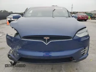 2020 Tesla Model X Long Range with VIN 5YJXCBE2XLF250234, listed as a Copart auction lot 42236365 with 63,401 mi miles and Non Repairable. Bid and sale history available at carsss.com. Image 5.