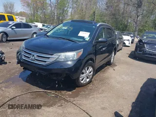 2014 Honda CR-V EX-L with VIN 2HKRM4H76EH673891, listed as a IAAI auction lot 42009693 with 103,798 mi miles. Bid and sale history available at carsss.com. Image 2.