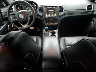 2018 Jeep Grand Cherokee Overland z VIN 1C4RJFCT3JC268599, wystawiony jako Copart lot #85242404 z przebiegiem 58 018 mil mil oraz Szkoda całkowita • Salvage title. Historia ofert i sprzedaży dostępna na DreamBid. Obrazek 8.
