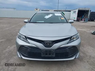 2019 Toyota Camry LE z VIN 4T1B11HK3KU769178, wystawiony jako IAAI lot #41348861 z przebiegiem 121 069 mil mil oraz . Historia ofert i sprzedaży dostępna na DreamBid. Obrazek 13.