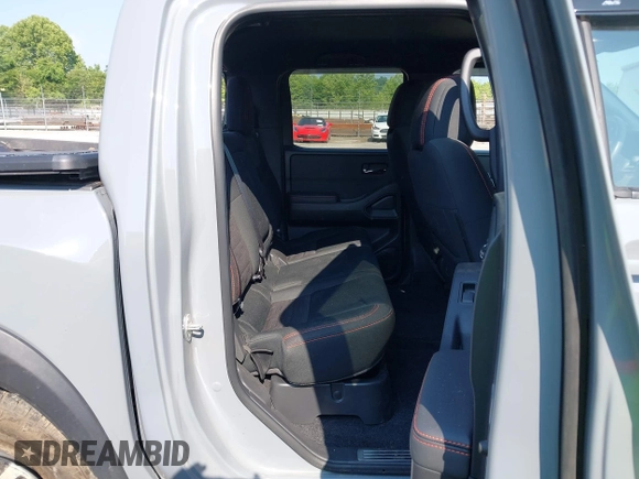 2023 Nissan Frontier SV with VIN 1N6ED1EK4PN622489, listed as a IAAI auction lot 42400562 with 25,595 mi miles and . Bid and sale history available at DreamBid. Image 8.