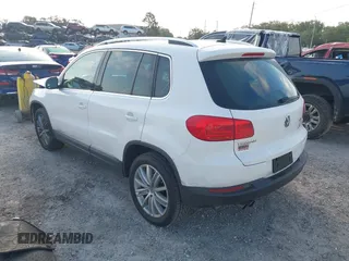 2013 Volkswagen Tiguan SE with VIN WVGAV7AX5DW545202, listed as a IAAI auction lot 42318584 with 91,556 mi miles and . Bid and sale history available at DreamBid. Image 3.
