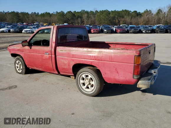 1989 Nissan Hardbody z VIN 1N6ND11S9KC399764, wystawiony jako Copart lot #87067574 z przebiegiem 87 990 mil mil oraz Szkoda całkowita • Salvage title. Historia ofert i sprzedaży dostępna na DreamBid. Obrazek 2.