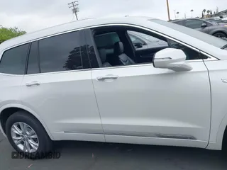 2021 Cadillac XT6 Luxury with VIN 1GYKPAR47MZ221123, listed as a IAAI auction lot 42374772 with 69,829 mi miles and . Bid and sale history available at DreamBid. Image 14.