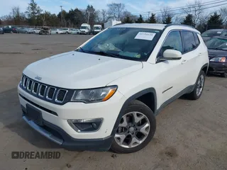 2020 Jeep Compass Limited with VIN 3C4NJDCB8LT127027, listed as a IAAI auction lot 41724110 with 94,896 mi miles and . Bid and sale history available at DreamBid. Image 2.