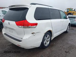 2012 Toyota Sienna LE AAS with VIN 5TDKK3DC3CS208853, listed as a IAAI auction lot 42205012 with 197,286 mi miles. Bid and sale history available at carsss.com. Image 4.