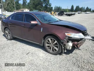 2009 Lincoln MKS z VIN 1LNHM94R89G601127, wystawiony jako Copart lot #60551075 z przebiegiem 102 000 mil mil oraz Szkoda całkowita • Salvage title. Historia ofert i sprzedaży dostępna na DreamBid. Obrazek 4.