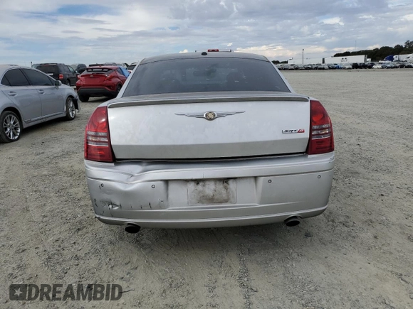 2007 Chrysler 300 C SRT8 with VIN 2C3LA73W07H660214, listed as a Copart auction lot 70283834 with 249,130 mi miles and Salvage Title. Bid and sale history available at carsss.com. Image 6.