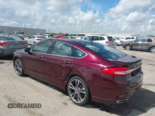 2017 Ford Fusion Titanium with VIN 3FA6P0K97HR214485, listed as a IAAI auction lot 40208619 with 39,265 mi miles and . Bid and sale history available at DreamBid. Image 3.