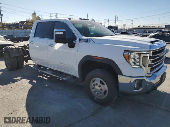 2023 GMC Sierra 3500HD SLT z VIN 1GT49UEY8PF154167, wystawiony jako Copart lot #84495904 z przebiegiem 43 395 mil mil oraz Czysty tytuł • Clean title. Historia ofert i sprzedaży dostępna na DreamBid. Obrazek 4.