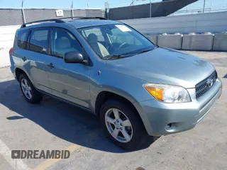 2006 Toyota RAV4 with VIN JTMZD33V465012121, listed as a IAAI auction lot 42013354 with 214,726 mi miles. Bid and sale history available at carsss.com. Image 1.
