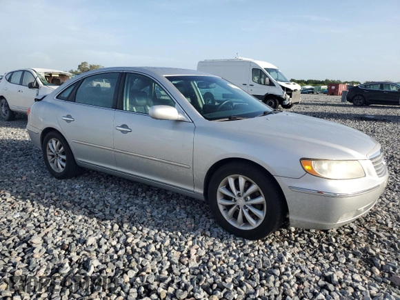 2006 Hyundai Azera SE with VIN KMHFC46F96A037972, listed as a Copart auction lot 61035765 with 140,857 mi miles and Salvage title. Bid and sale history available at DreamBid. Image 4.