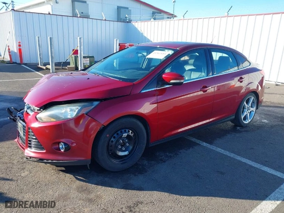 2014 Ford Focus Titanium with VIN 1FADP3J23EL137525, listed as a IAAI auction lot 41562684 with 127,104 mi miles. Bid and sale history available at carsss.com. Image 2.