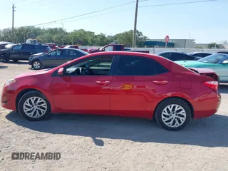 2018 Toyota Corolla L z VIN 2T1BURHE1JC011808, wystawiony jako IAAI lot #42289116 z przebiegiem 124 379 mil mil oraz . Historia ofert i sprzedaży dostępna na DreamBid. Obrazek 14.