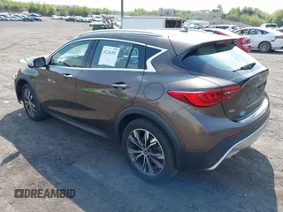 2018 Infiniti QX30 Premium z VIN SJKCH5CR0JA051889, wystawiony jako IAAI lot #42234392 z przebiegiem 104 095 mil mil oraz . Historia ofert i sprzedaży dostępna na DreamBid. Obrazek 3.