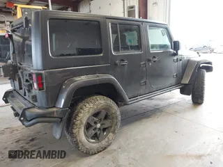 2017 Jeep Wrangler Unlimited Sahara with VIN 1C4BJWEG8HL638067, listed as a IAAI auction lot 41274352 with 57,339 mi miles. Bid and sale history available at carsss.com. Image 4.