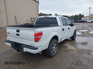 2014 Ford F-150 XL with VIN 1FTFW1CF8EFA66332, listed as a IAAI auction lot 41033667 with 200,513 mi miles. Bid and sale history available at carsss.com. Image 4.