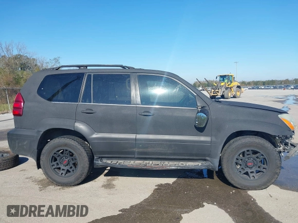 2005 Lexus GX 470 z VIN JTJBT20X150087128, wystawiony jako IAAI lot #41124756 z przebiegiem 221 052 mil mil oraz . Historia ofert i sprzedaży dostępna na DreamBid. Obrazek 13.