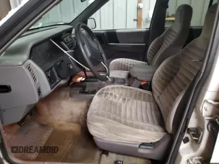 1995 Jeep Grand Cherokee Laredo with VIN 1J4GZ58S6SC630947, listed as a Copart auction lot 82143564 with 267,946 mi miles and Salvage Title. Bid and sale history available at carsss.com. Image 7.
