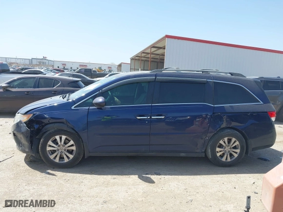 2016 Honda Odyssey SE with VIN 5FNRL5H36GB049807, listed as a IAAI auction lot 41818761 with 172,504 mi miles. Bid and sale history available at carsss.com. Image 14.