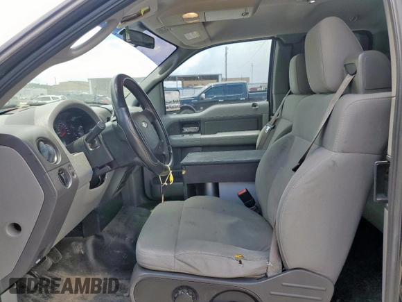 2007 Ford F-150 STX с VIN 1FTRX12W87NA43184, выставлен на аукционе Copart как лот 62112925 с пробегом 210 369 миль миль и Списание • Salvage title. История ставок и продаж доступна на DreamBid. Изображение 7.