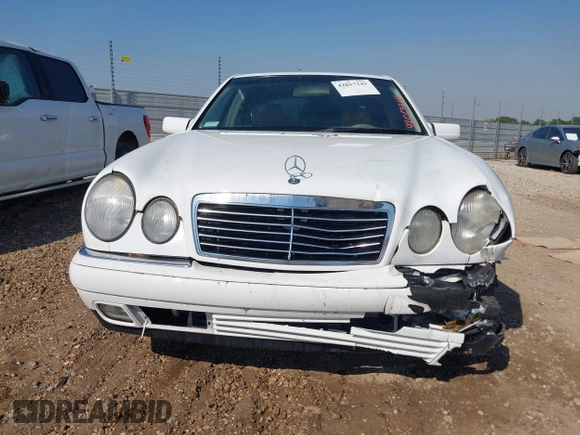 1999 Mercedes-Benz E-Class with VIN WDBJF65H6XA867166, listed as a IAAI auction lot 42017341 with 89,841 mi miles. Bid and sale history available at carsss.com. Image 12.
